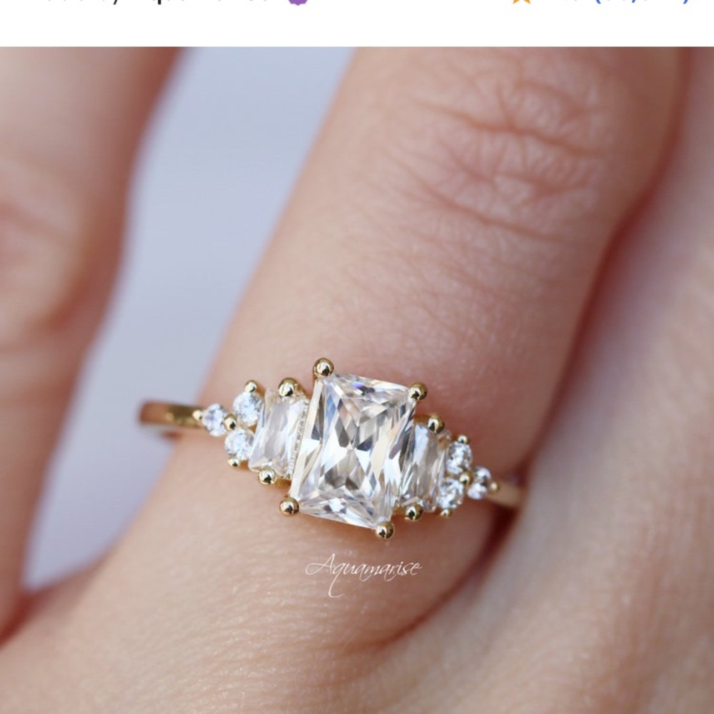 Woman’s Emerald Cut  Gold Engagement Ring
